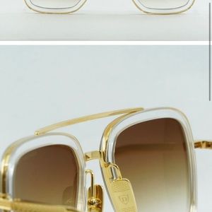 Brand new with case. Gold Frame Dita sunglasses
